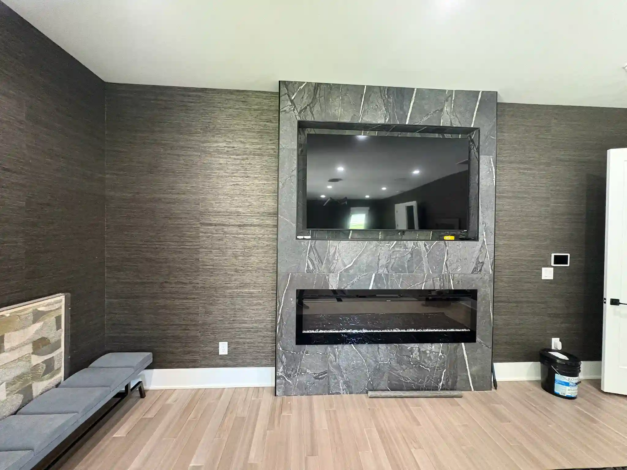 Luxury fabric wallpaper installation
